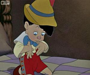 Puzle Pinocchio surpreso ao ver que há um menino de verdade
