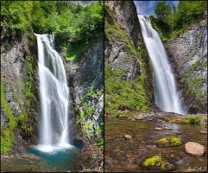 Puzle a cachoeira do Saut deth Pish, entre 25 e 30 metros de altura do Vale de Aran, Catalunha, Espanha.