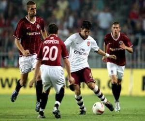 Puzle Ação de um jogo de futebol no estádio