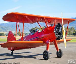 Puzle Avião biplano vermelho