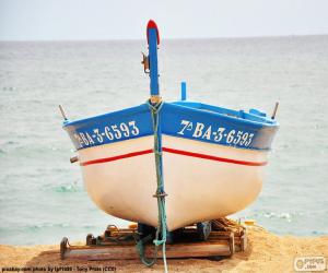 Puzle Barco que encalhado na praia