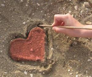 Puzle Coração desenhada na areia