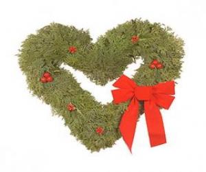 Puzle Coroa do Natal em forma de coração feita de folhas de abeto