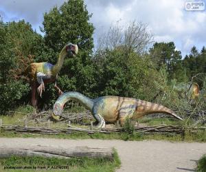 Puzle Grupo de três dinossauros na paisagem