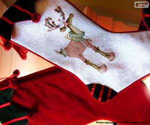 Puzle Natal meias e um vermelho decorado com desenhos de renas
