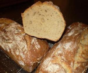 Puzle O pão é um alimento básico que faz parte da dieta tradicional na Europa, Oriente Médio, Índia e América.