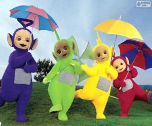 Puzle Os quatro Teletubbies com seus guarda-chuvas abertos