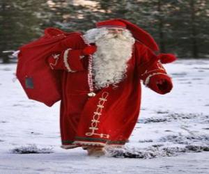 Puzle Pai Natal ou Papai Noel carregando um saco cheio de presentes