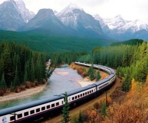 Puzle Passageiros do comboio em uma paisagem montanhosa
