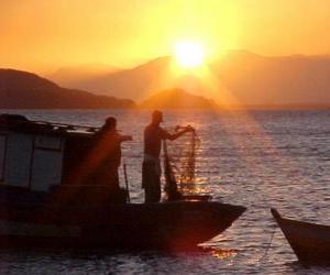 Puzle Pescadores ao pôr do sol