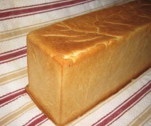 Puzle Pão de forma feito em um molde ou forma para ser cortado em fatias, como um pão prefatiado
