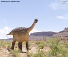 Dinossauro num paisagem deserto