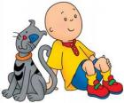 Caillou sentado no chão com seu gato Gilbert