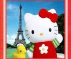Hello Kitty com um passarinho e da Torre Eiffel ao fundo
