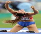 Yelena Isinbayeva celebrando um bom salto