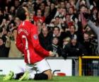 Cristiano Ronaldo comemorando um gol, quando ele jogou pelo Manchester United