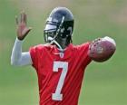 Michael Vick em ação, pronto para tentar um passe