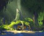 A casa do Shrek no pântano cercado por vegetação