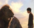 Aslam o leão falando com o jovem Edmund