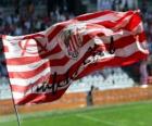 A bandeira do Clube Atlético é listras vermelhas e brancas