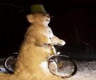 Boneco de neve em bicicleta
