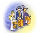 Três crianças vestidas para o doce ou travessura - Um fantasma, uma bruxa e um demônio com sacos