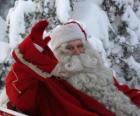 Papai Noel cumprimentando com a mão