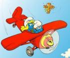 Smurf e Smurfette a pilotar um avião vermelho