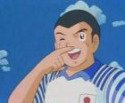 Ryo Ishizaki ou Bruce Harper, personagem de Captain Tsubasa está comemorando um gol
