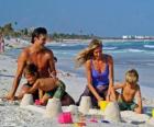 Família na praia