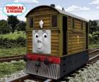 Toby é o trem-bonde marrom, número 7, O Toby é a locomotiva Nº 7 castanha