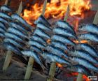 Sardinhas cozinhadas com lenha