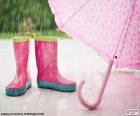 Botas e guarda-chuva rosa