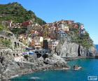 Manarola é uma pequena vila costeira, localizada em Cinque Terre, província da Spezia no mar da Ligúria, Itália