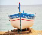 Barco que encalhado na praia