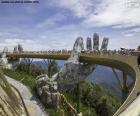 Ponte dourada espetacular de Da Nang, 150m de comprimento e apoiada por um par de mãos