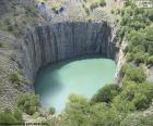 O Big Hole é uma mina a céu aberto localizada na cidade de Kimberley, África do Sul. É o maior buraco cavado à mão no mundo, agora está cheio de água formando um pequeno lago