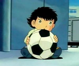 Puzle Tsubasa Ozora, Oliver Hutton, uma criança japonesa que é um grande adepto de futebol