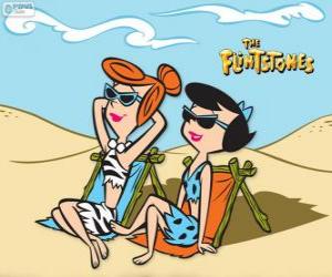 Puzle Wilma Flintstone e Betty Rubble nos banhos de sol na praia